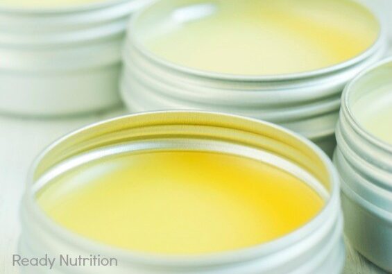 natural lip balms from beeswax in tin pots