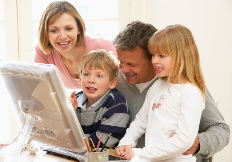 Family Group Using Computer