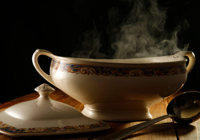 Antique Classical bowl of soup, with steam