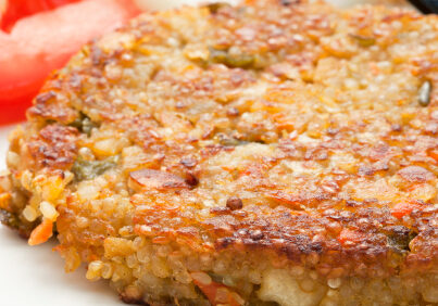 Closeup of  a vegetarian quinoa burger.