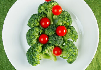 Christmas tree made from broccoli and cherry tomatoes