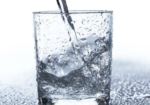 Glass with water on the table