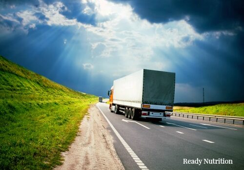 trucks under colorful sky